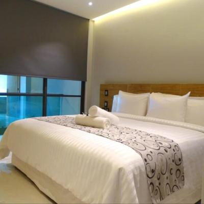Hotel Kavia Plus (Av. Yaxchilan, Mz 15, Lote 13, SM 22 Entre calle Gladiolas y calle Orquideas 77500 Cancún)