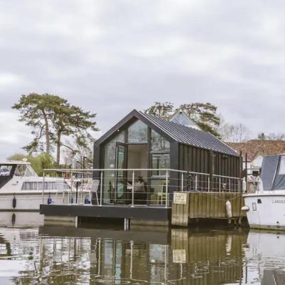 Photo Water Cabin With Water Sports Equipment and Bikes, Bath