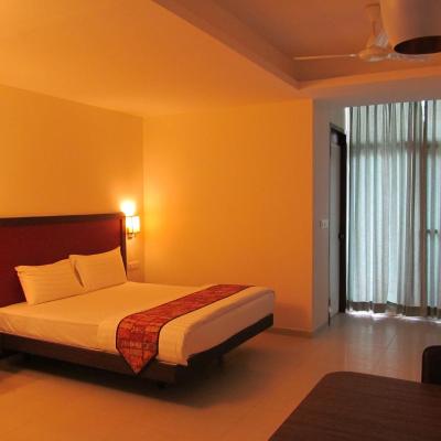 Ixora Suites (No.18 & 19, NGEF Lane, 9th Main, Indiranagar 1st Stage, Adjacent to Metro Station 560038 Bangalore)